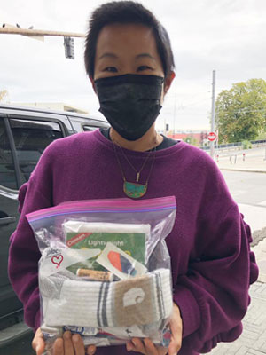 Volunteer donates care kit