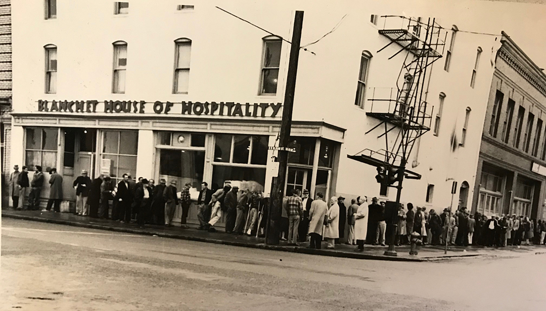 Guests line up for a hot meal at Blanchet House of Hospitality in 1959.