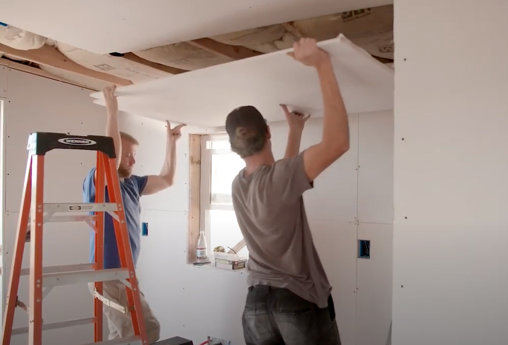 Danny Welch builds tiny home alongside Aaaron Donaldson at Blanchet Farm.