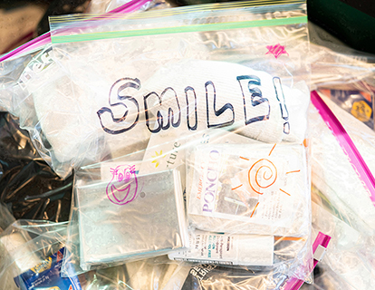 Care kit with SMILE written on it Blanchet House