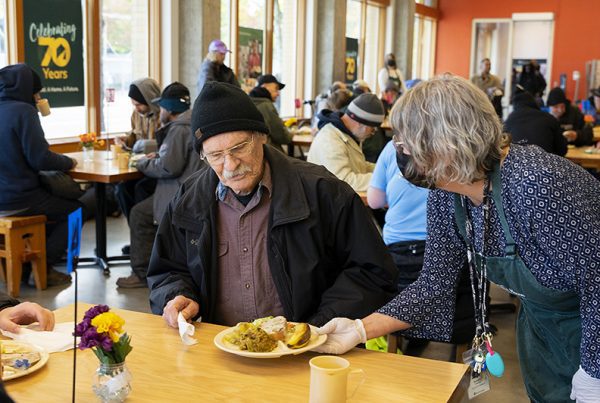 Senior citizen eating in cafe Loneliness Relief