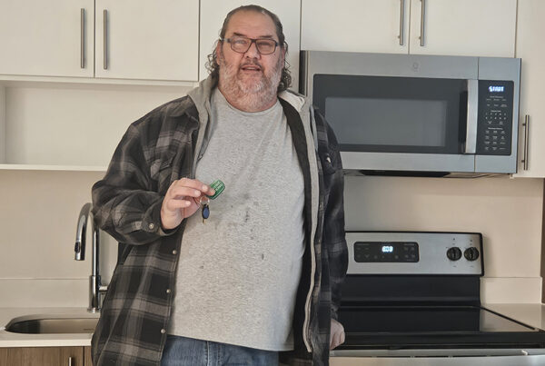 John Judge in apartment Easter Seals 1
