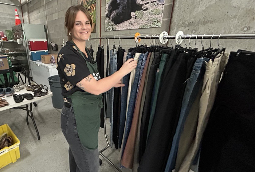 Realtor Lucia Keefe volunteers in the clothing closet at Blanchet House.
